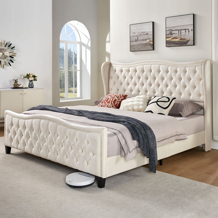 Upholstered bed with deals footboard